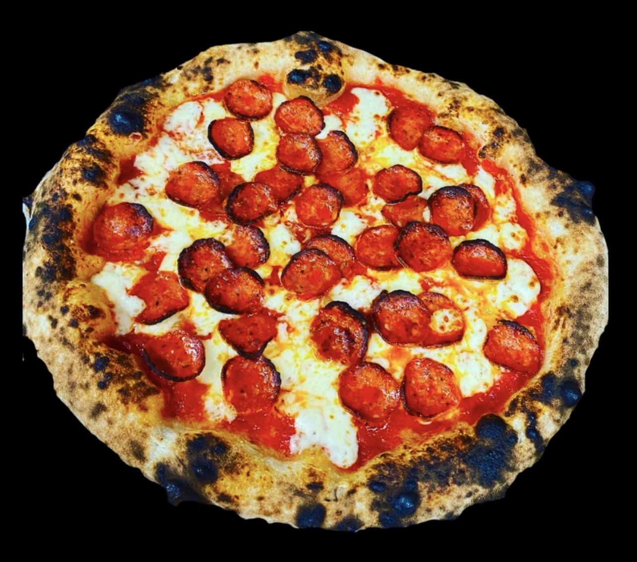Fresh pepperoni pizza with a blistered hand-stretched crust